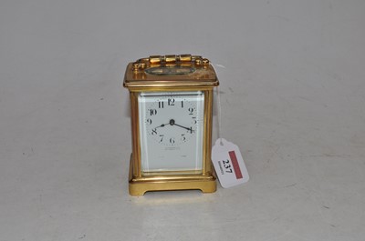 Lot 237 - A lacquered brass cased carriage clock having...