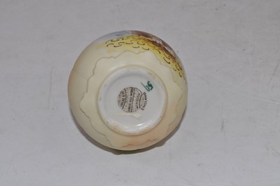 Lot 244 - A Royal Worcester blush ivory and floral...