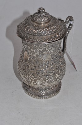 Lot 267 - A late 19th century Indian white metal tankard,...