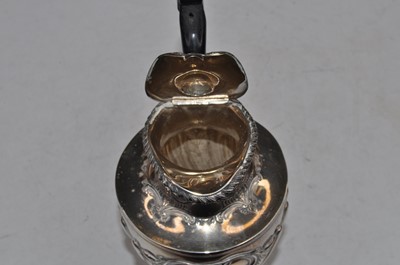 Lot 280 - A Victorian silver hot water jug, the hinged...