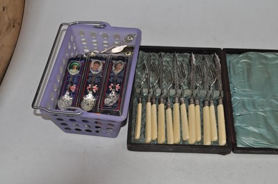 Lot 286 - A cased set of six silver plated fish knives...