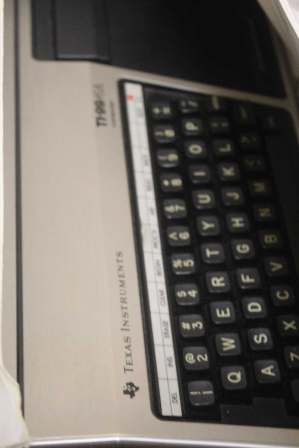 Lot 519 - A Texas Instruments TI-99/4A computer, with...