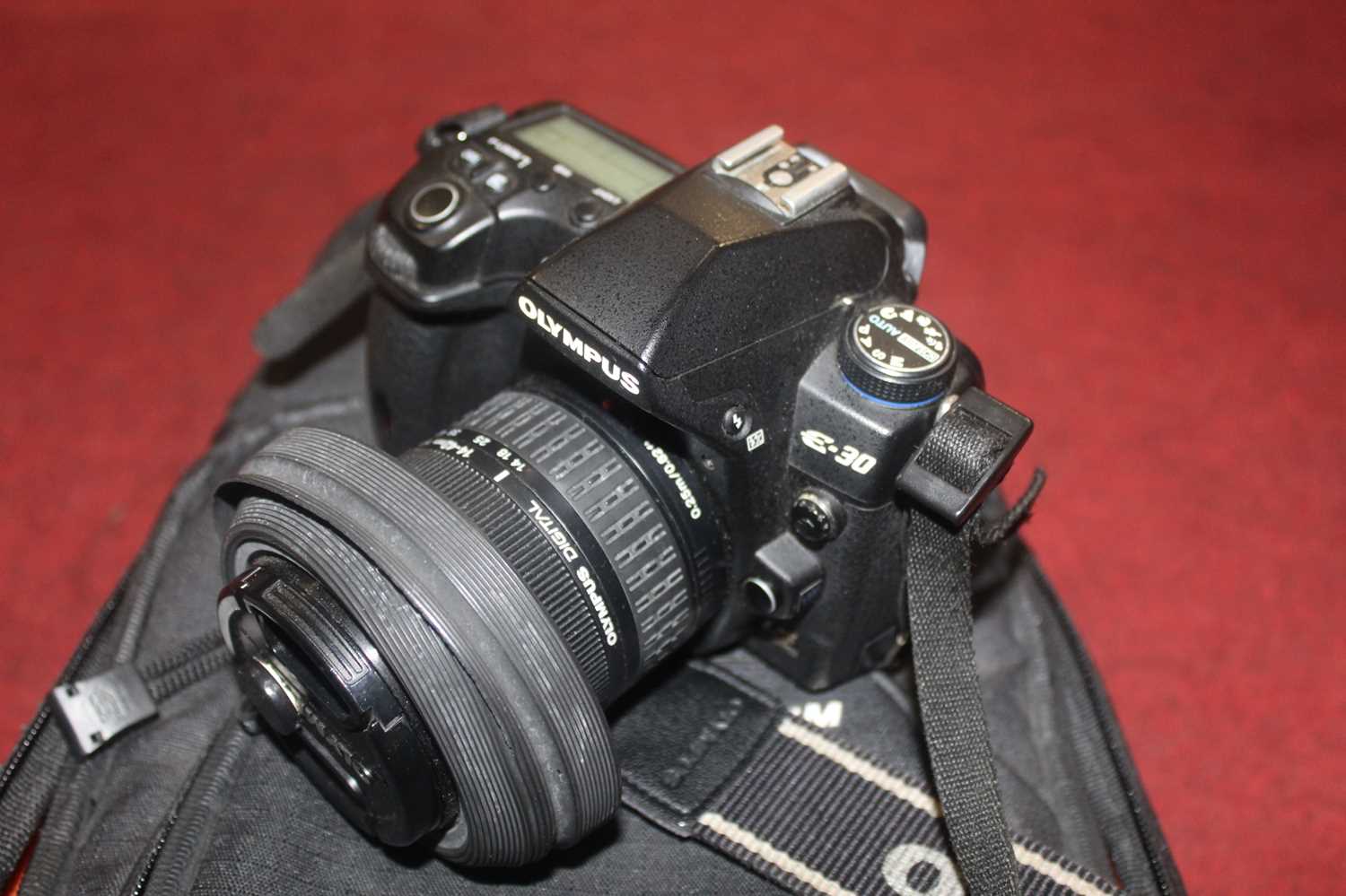 Lot 538 - An Olympus E-30 digital camera, with lens...