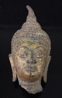 Lot 303 - An 18th century Thai Buddha head, cast in...