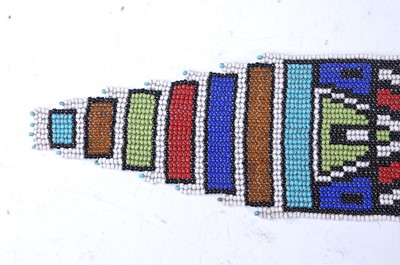 Lot 191 - A beadwork belt of geometric design with black,...