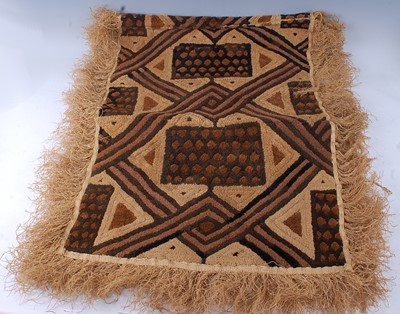 Lot 196 - A raffia cloth, woven as an inter linked...