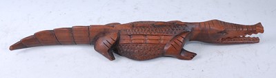 Lot 202 - A collection of three native hardwood figures,...