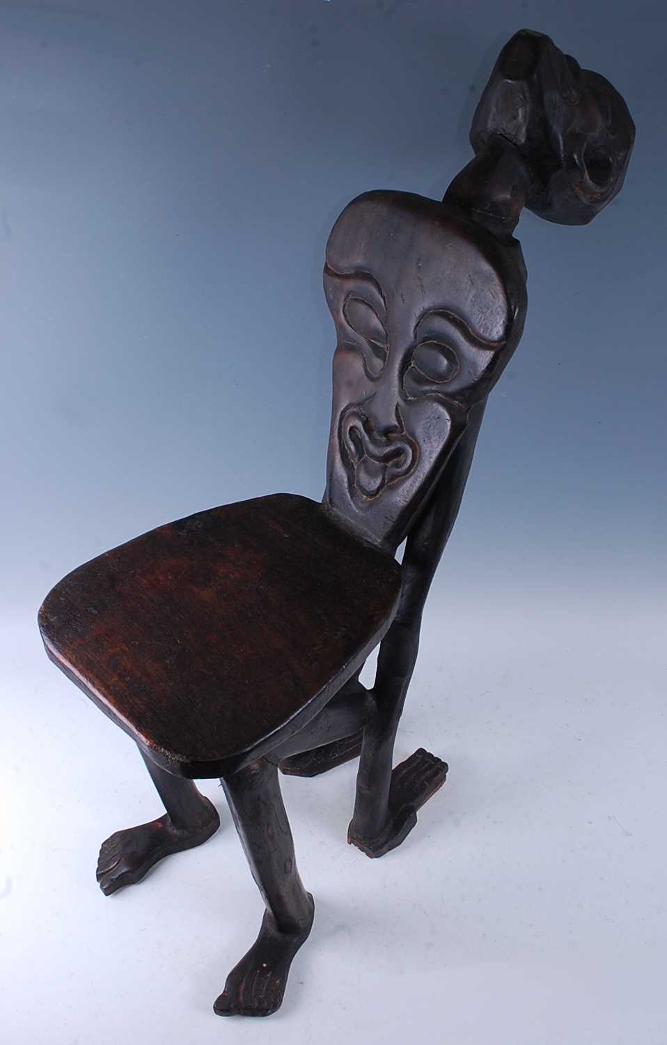 Lot 306 - A hardwood figural chair, carved as a male...