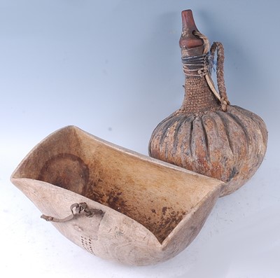 Lot 206 - An African husk/calabash gourd drinking vessel,...
