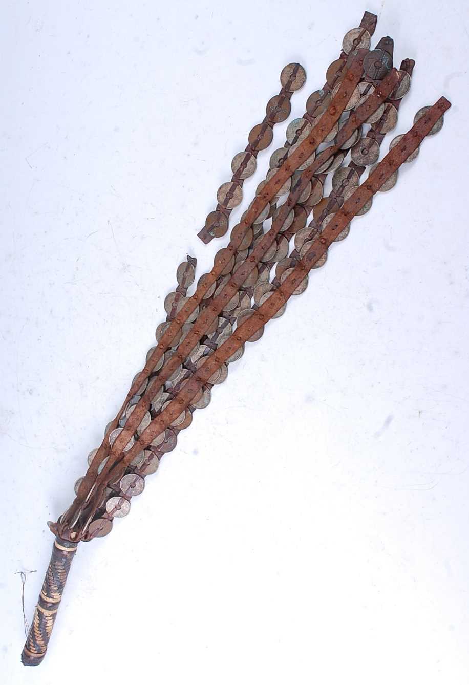 Lot 209 - A West African whip/fly whisk, having eight...