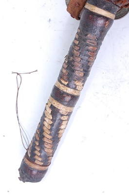 Lot 209 - A West African whip/fly whisk, having eight...