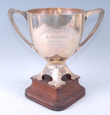 Lot 296 - An Edwardian silver trophy cup, having twin...