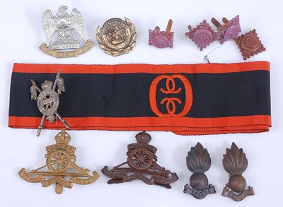Lot 19 - A small collection of cap badges and insignia...