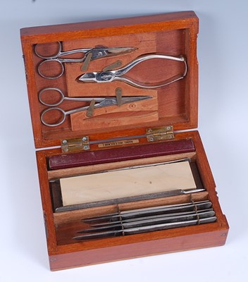 Lot 48 - A military field surgeons kit, the mahogany...