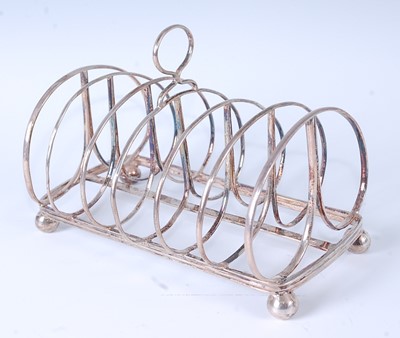 Lot 2122 - * A George IV silver six-division toast rack,...
