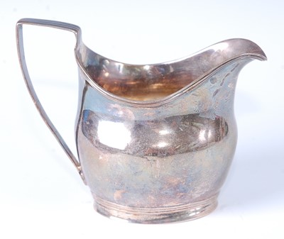 Lot 2125 - * A George III silver cream jug, of helmet...