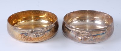 Lot 2196 - * A pair of silver gilt wine tasters, each...