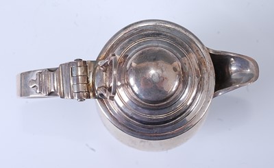 Lot 1062 - An early George III silver wine or beer jug,...