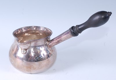 Lot 2279 - * A George II silver brandy saucepan, having a...