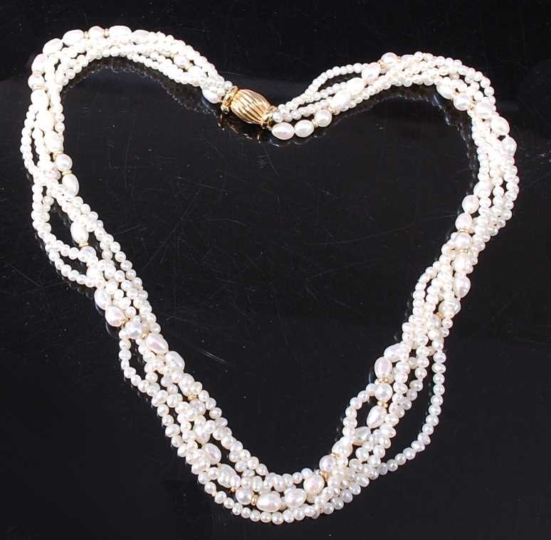 Lot 2597 - A five-strand twist freshwater pearl necklace,...
