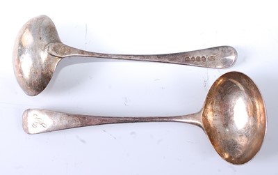 Lot 2136 - * A pair of George III silver sauce ladles in...