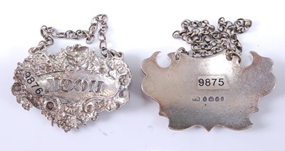 Lot 2234 - * A George IV silver wine label, of escutcheon...