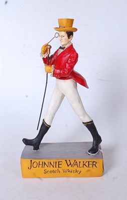 Lot 6 - A reproduction painted resin Johnnie Walker...