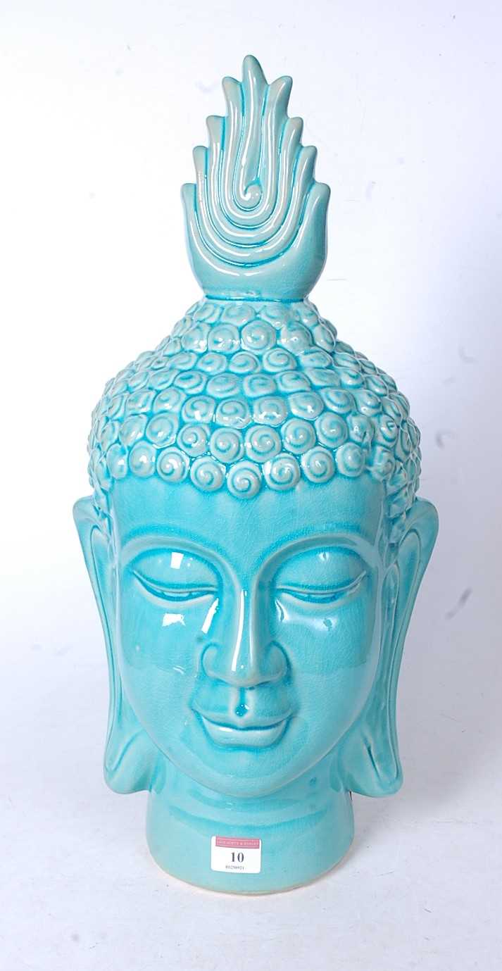 Lot 10 - A large modern turquoise glazed ceramic bust...