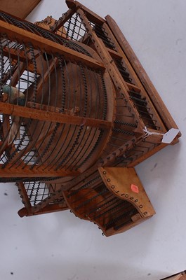 Lot 11 - A large softwood and wirework birdcage, of...