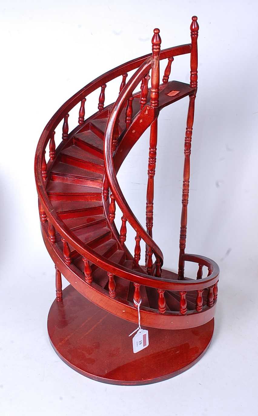 Lot 19 - A modern stained ply model of a spiral...