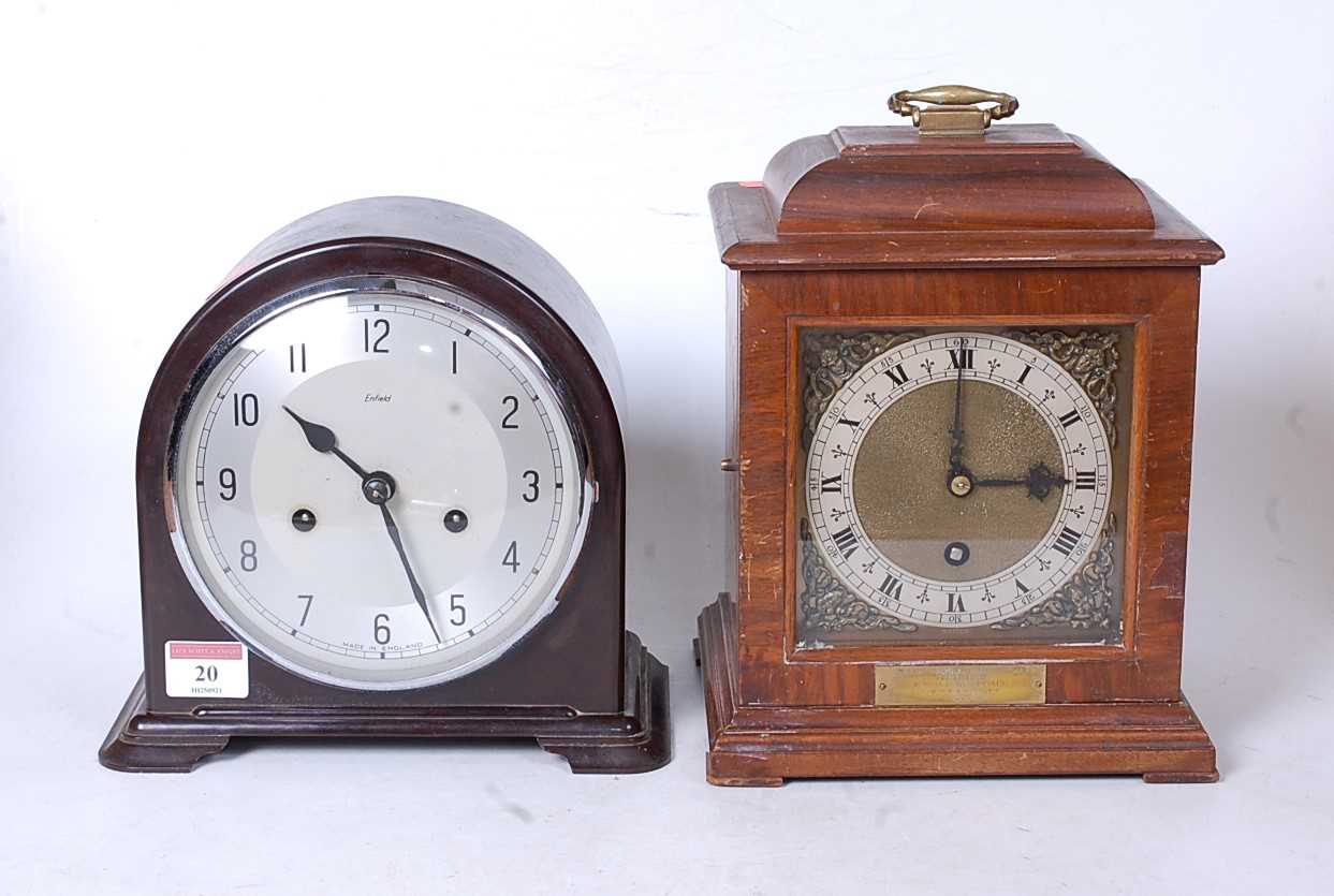 Lot 20 - A mid-20th century walnut cased mantel clock,...