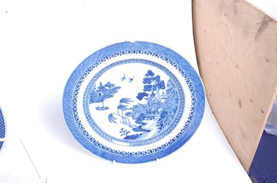 Lot 29 - An 18th century blue and white pearlware plate,...