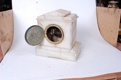 Lot 34 - A late Victorian alabaster cased mantel clock,...