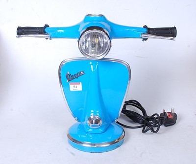 Lot 54 - A modern table lamp in the form of a Vespa...