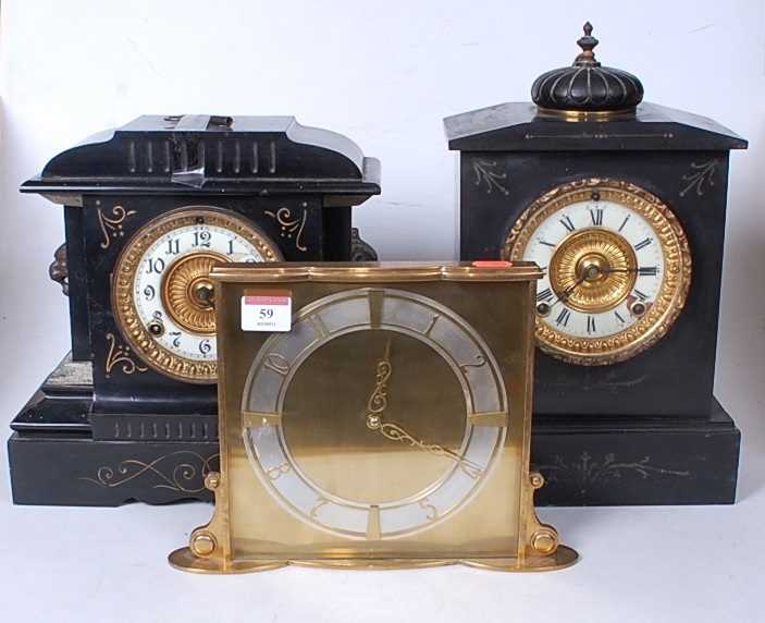Lot 59 - A late Victorian black slate mantel clock of...