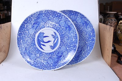 Lot 64 - A pair of Japanese blue and white chargers,...
