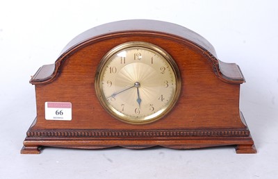 Lot 66 - A 1920s mahogany cased mantel clock, having...