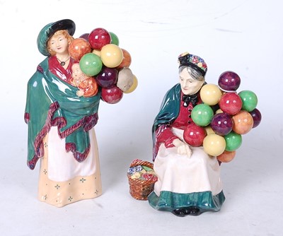 Lot 67 - Two Royal Doulton figurines, being The Balloon...
