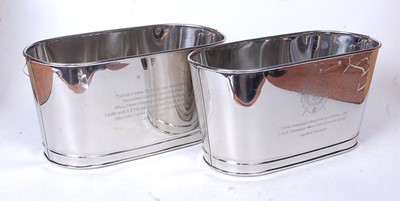 Lot 69 - A pair of plated champagne buckets, each...