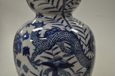Lot 190 - A Chinese export blue and white double-gourd...