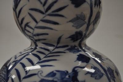 Lot 71 - A Chinese export blue and white double-gourd...