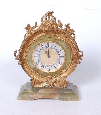 Lot 101 - A Rococo style green onyx and gilt metal...