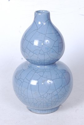 Lot 103 - A Chinese blue crackle glazed double gourd...