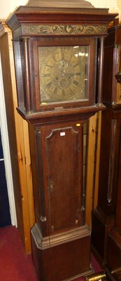 Lot 1121 - A circa 1800 provincial oak longcase clock,...