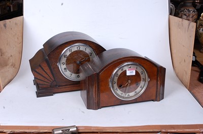 Lot 105 - A 1950s oak cased mantel clock having a...