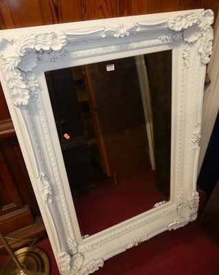 Lot 1119 - A contemporary white painted and heavily...