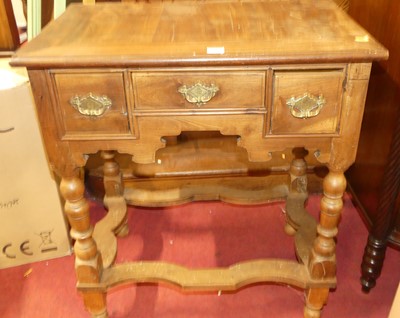 Lot 1124 - A provincial Georgian style walnut and...