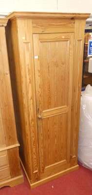 Lot 1128 - A modern pine single door wardrobe, w.76cm