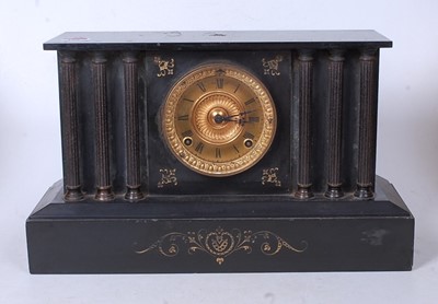 Lot 120 - A late Victorian black slate mantel clock, of...