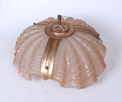 Lot 122 - A 1930s pink tinted moulded glass and brass...